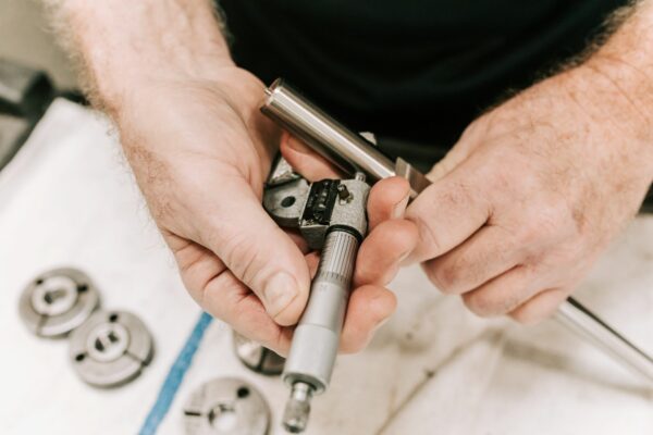 Thirty Two Machine doing Micrometer Inspection